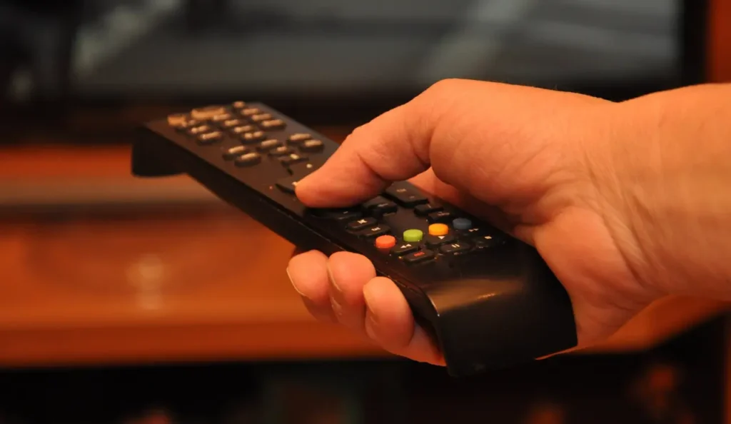 Best IPTV provider USA streaming live TV channels in HD and 4K on Smart TV using M3U playlist with sports and movies content displayed on screen.